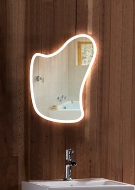 Bathroom Mirror with Light The Future Lit Bathroom Mirror has such an unusual shape, a real eye catcher!These mirrors are fitted with a heated pad that helps to clear condensation from the central area of the mirror.Sensor switch, simply wave your hand by the sensor to turn the light on and off.IP44 – Electrically safe for use in the bathroom.Fixtures & fittings included.  Dimensions: 80 cm (h) x 60 cm (w) Overall